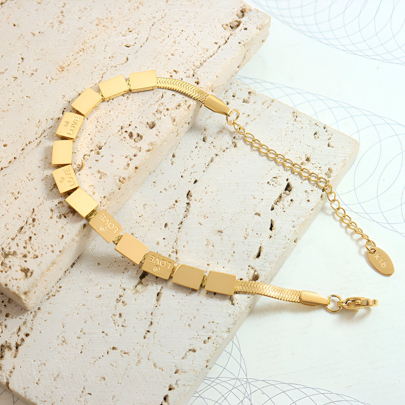 LOIS | Bransoletka z tytanu pokryta 18-karatowym złotem, model Love, Loïs